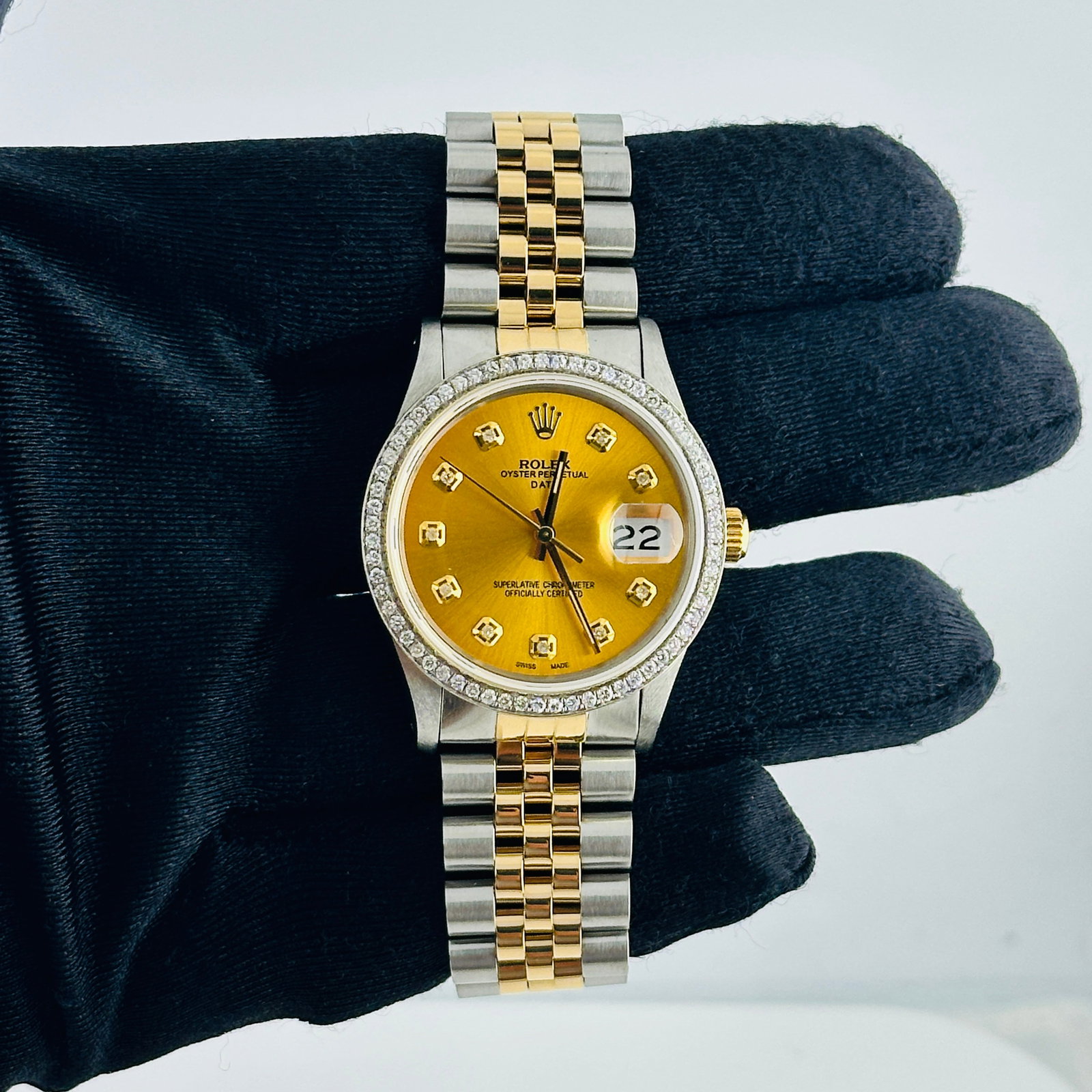 Rolex Aftermarket Champagne Diamond Dial Date Watch Ref 15053 on D Link Jubilee: Rolex Aftermarket Champagne Diamond Dial Date Watch Ref 15053 on D Link Jubilee This Rolex Oyster Perpetual Date features an aftermarket champagne diamond dial set on a D-Link Jubilee bracelet. The wa