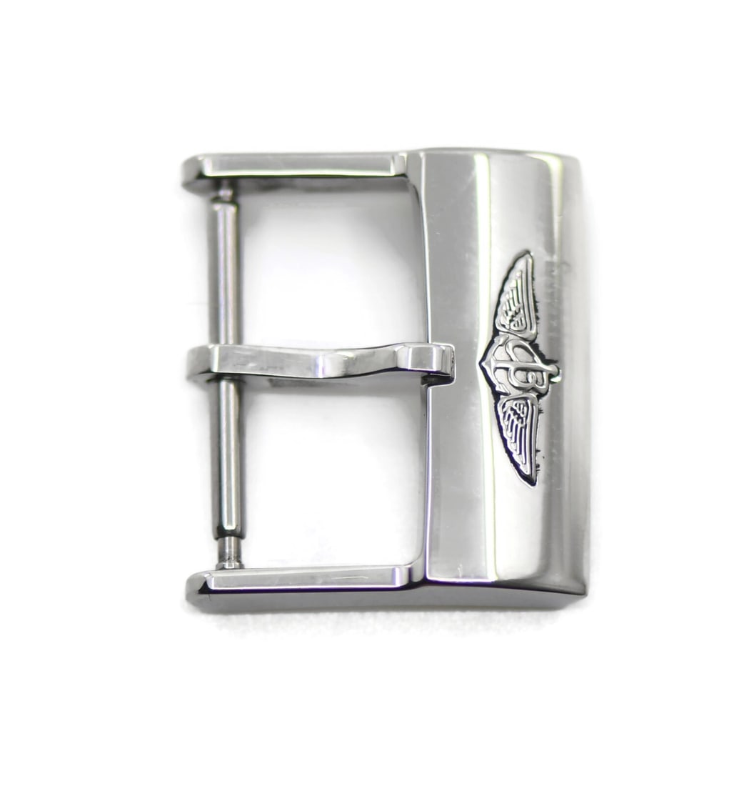 Authentic Breitling 20mm Stainless Steel Tang Buckle: Authentic Breitling 20mm Stainless Steel Tang Buckle This authentic Breitling stainless steel tang buckle is designed for wristwatch bands with a width of 20 mm. Crafted from durable stainless steel, 