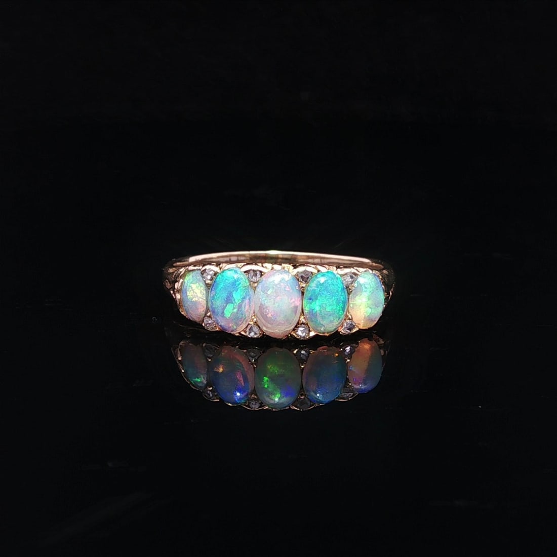 Antique Solid Yellow Gold Opal Rose Cut Diamond Band Ring: Antique Solid Yellow Gold Opal Rose Cut Diamond Band Ring This exquisite antique band ring features a stunning arrangement of five natural genuine opals, each in an oval cabochon cut, prong set to sho