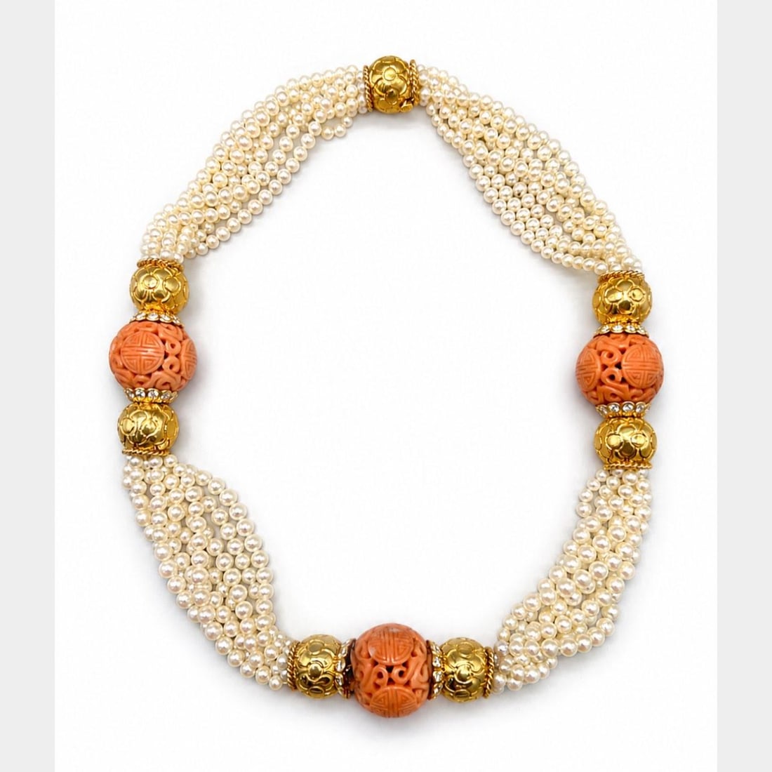 Van Cleef Arpels 18K Gold Necklace with Coral and Cultured Pearls: Van Cleef Arpels 18K Gold Necklace with Coral and Cultured Pearls An 18K yellow gold necklace featuring carved coral and cultured pearls. The piece weighs 177.7 grams and measures 20 inches in length.