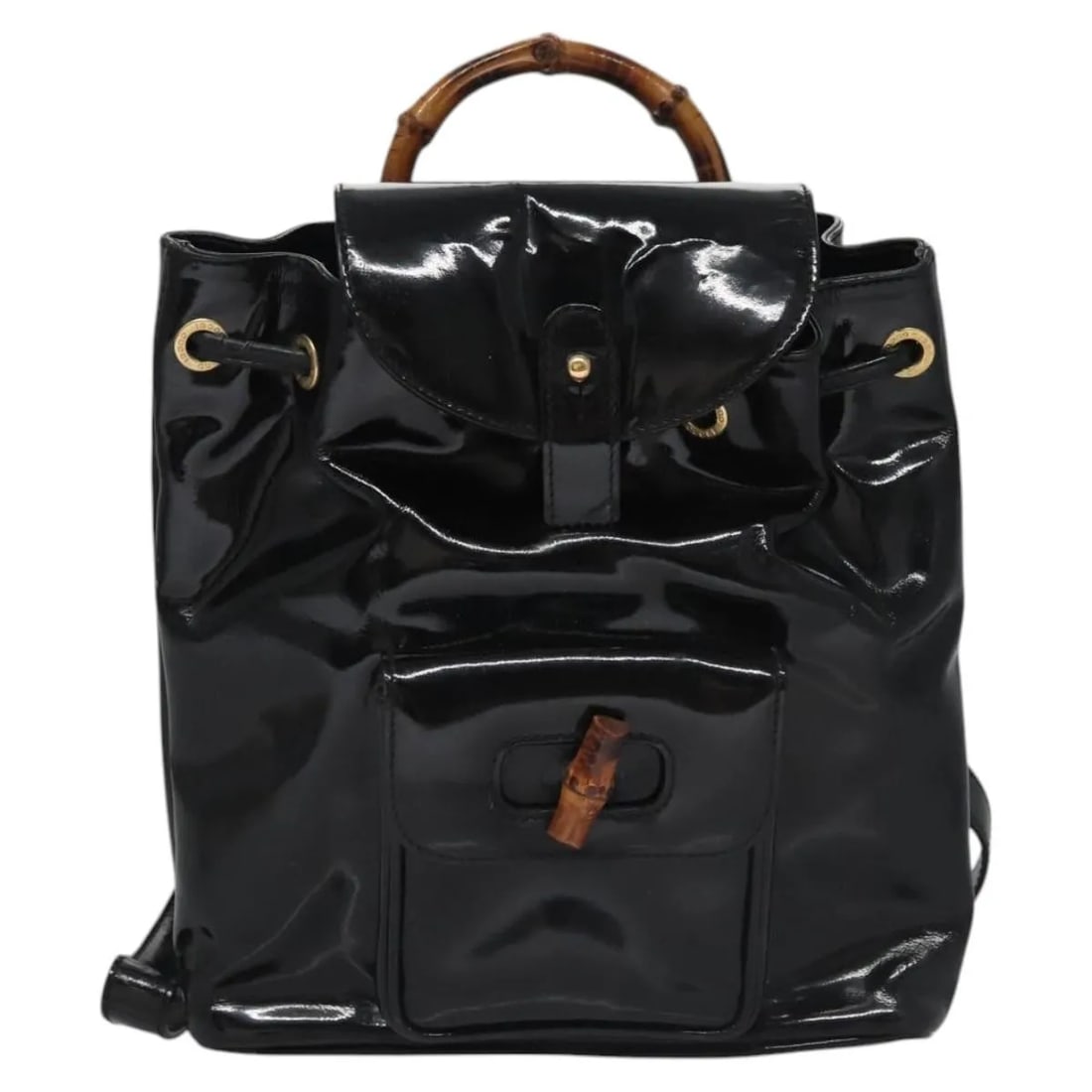 Gucci Vintage Bamboo black patent leather backpack: Gucci Vintage Bamboo black patent leather backpack This Gucci Vintage Bamboo Backpack is crafted from black patent leather and features a signature bamboo handle. Designed for women, the backpack offe