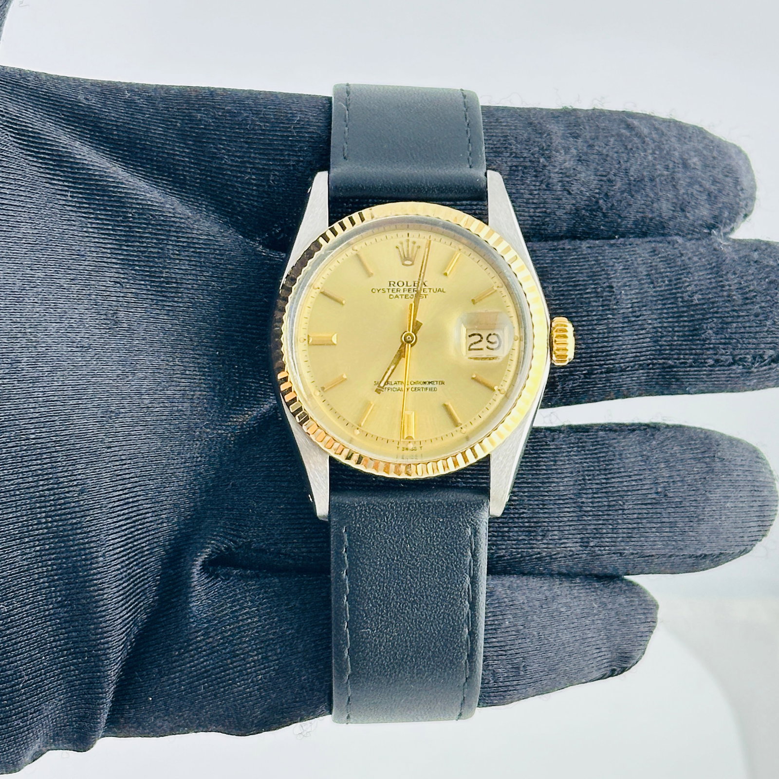 Rolex 1601 Datejust mens watch champagne stick dial leather strap: Rolex 1601 Datejust mens watch champagne stick dial leather strap Rolex Datejust reference 1601 with a champagne stick dial, fluted bezel, and generic leather band. This men's watch is identified as p