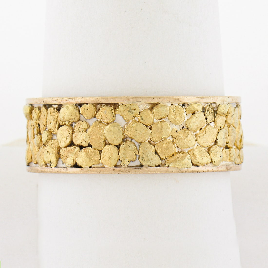 Vintage 18k Yellow Gold 7.9mm Nugget Textured Eternity Band Ring: Vintage 18k Yellow Gold 7.9mm Nugget Textured Eternity Band Ring This vintage solid 18k yellow gold eternity band ring features a unique nugget textured design, making it a stunning addition to any je