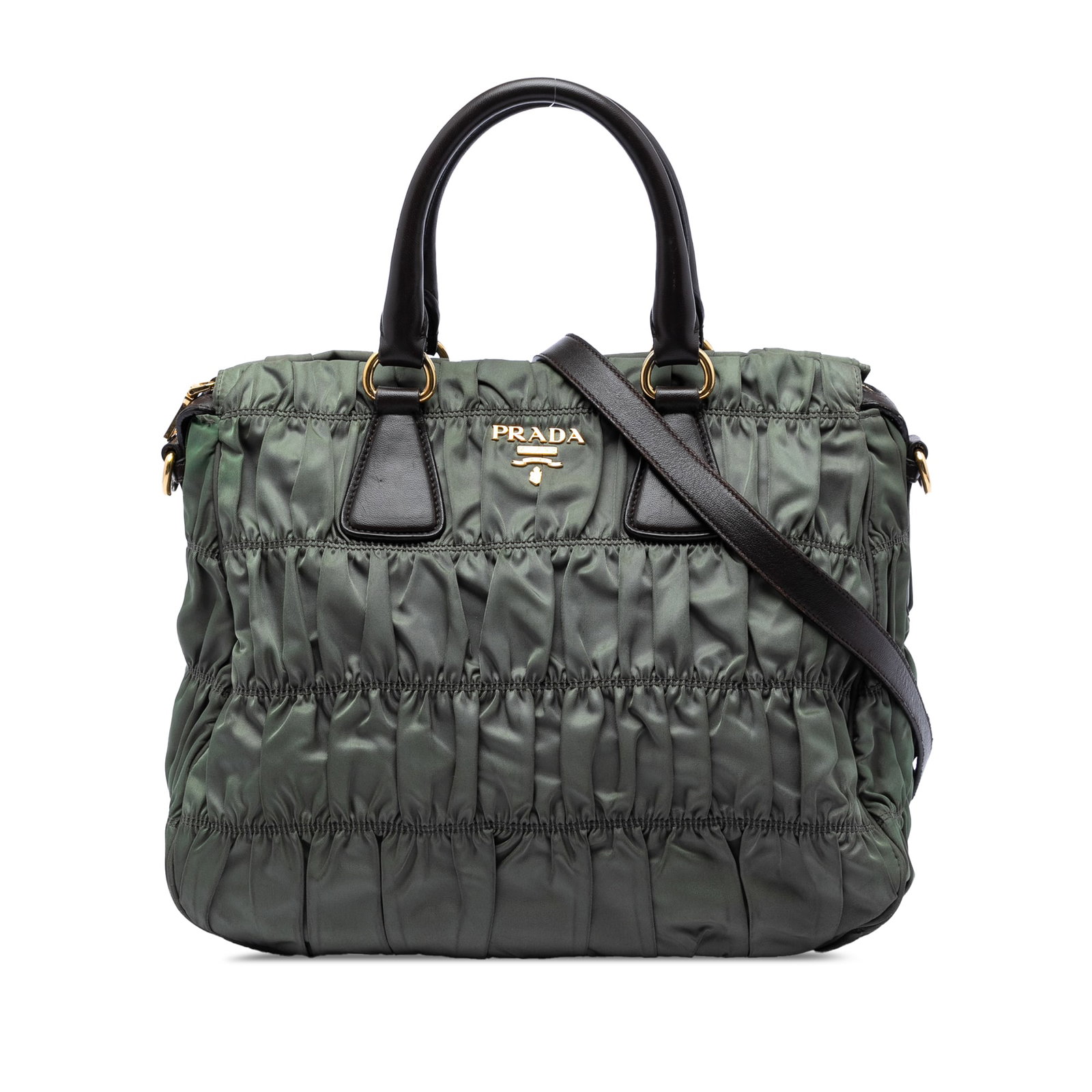 Prada Tessuto Gaufre Green Nylon Satchel with Detachable Strap: Prada Tessuto Gaufre Green Nylon Satchel with Detachable Strap Prada Tessuto Gaufre Satchel in green, made in Italy, with a gathered nylon body, rolled leather handles, a detachable flat leather strap