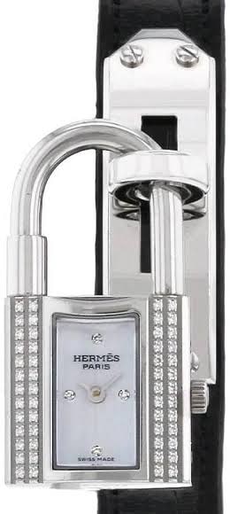 Hermes Kelly Ladies Watch Ref. KE1.232 White MOP Dial Leather Strap: Hermes Kelly Ladies Watch Ref. KE1.232 White MOP Dial Leather Strap Hermes Kelly ladies watch featuring a white mother-of-pearl dial, factory diamond bezel, and leather bracelet. Reference KE1.232. Sp