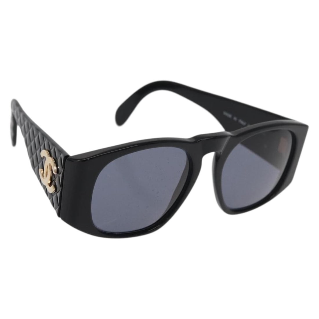 CHANEL CC Black Plastic Sunglasses with Case Made in Italy: CHANEL CC Black Plastic Sunglasses with Case Made in Italy CHANEL black plastic sunglasses made in Italy, offered with a sunglass case. The item shows reasonable wear and tear consistent with conditio
