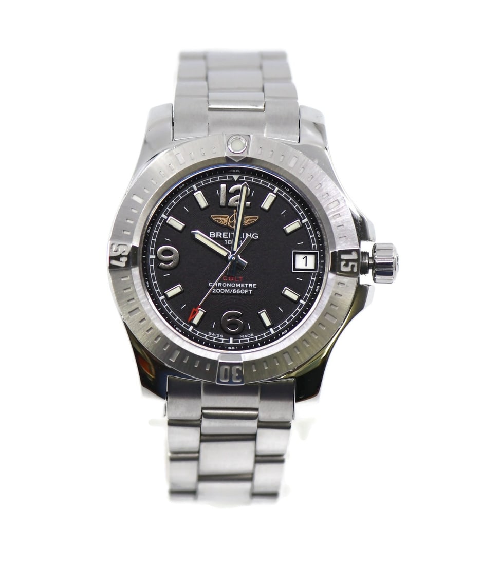 Breitling Colt A74389 Stainless Steel Quartz Watch with Box and Papers: Breitling Colt A74389 Stainless Steel Quartz Watch with Box and Papers This Breitling Colt wristwatch combines elegance and functionality in a sleek design. Crafted with a durable stainless steel case
