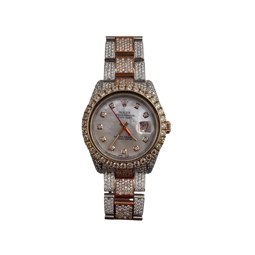 Rolex Datejust Ref 116261 White Mother of Pearl Dial Oyster Bracelet: Rolex Datejust Ref 116261 White Mother of Pearl Dial Oyster Bracelet This men's Rolex Datejust features a white Mother of Pearl dial, a diamond bezel, and is presented on an Oyster bracelet. The watch