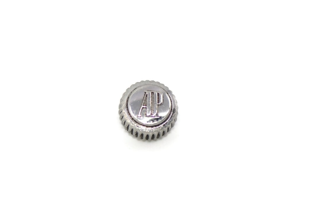 Authentic Audemars Piguet 6.3mm Watch Crown: Authentic Audemars Piguet 6.3mm Watch Crown This authentic Audemars Piguet crown, measuring 6.3mm, is designed for compatibility with Audemars Piguet watches. It is a crucial component for maintaining