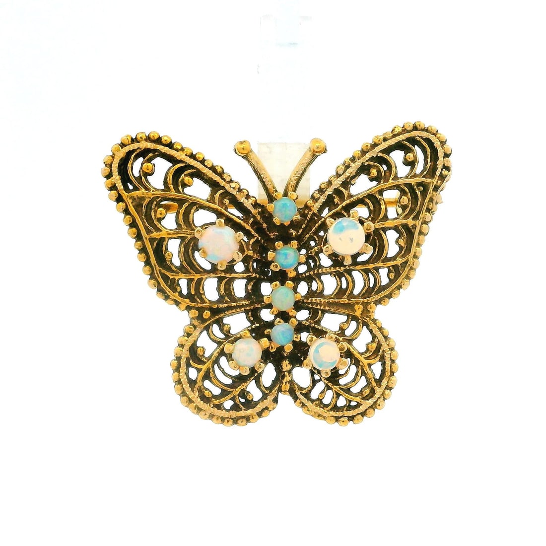 14k Yellow Gold Butterfly Brooch with Opal Detailed Filigree: 14k Yellow Gold Butterfly Brooch with Opal Detailed Filigree This exquisite Estate 14k Yellow Gold Butterfly Pin Brooch showcases a delicate filigree open work design, adorned with eight natural genui