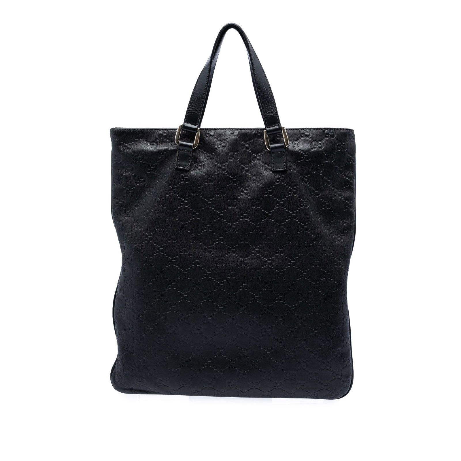 Gucci Guccissima Leather Black Tote Bag: Gucci Guccissima Leather Black Tote Bag This Guccissima Tote features an embossed leather body in black, complemented by flat leather handles and an open top with a magnetic snap closure. The interior