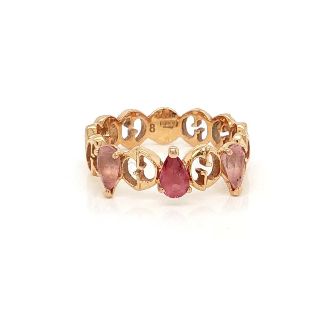 Gucci Logo Ring 18k Rose Gold Pink Sapphire Size 4: Gucci Logo Ring 18k Rose Gold Pink Sapphire Size 4 This Gucci logo band ring is crafted in 18k rose gold and features a natural pink sapphire accent. It is made in Italy, marked Au750, and presented i