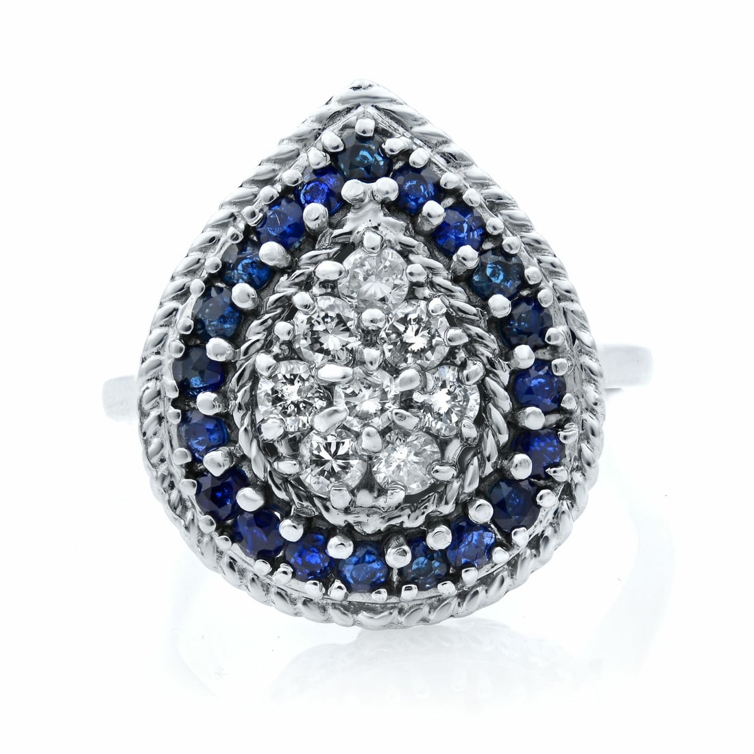Rachel Koen 14K White Gold Cocktail Ring with Pear Diamonds & Blue Sapphires: Rachel Koen 14K White Gold Cocktail Ring with Pear Diamonds & Blue Sapphires This stunning cocktail ring by Rachel Koen features a captivating pear-shaped center adorned with 0.32 carats of sparkling 