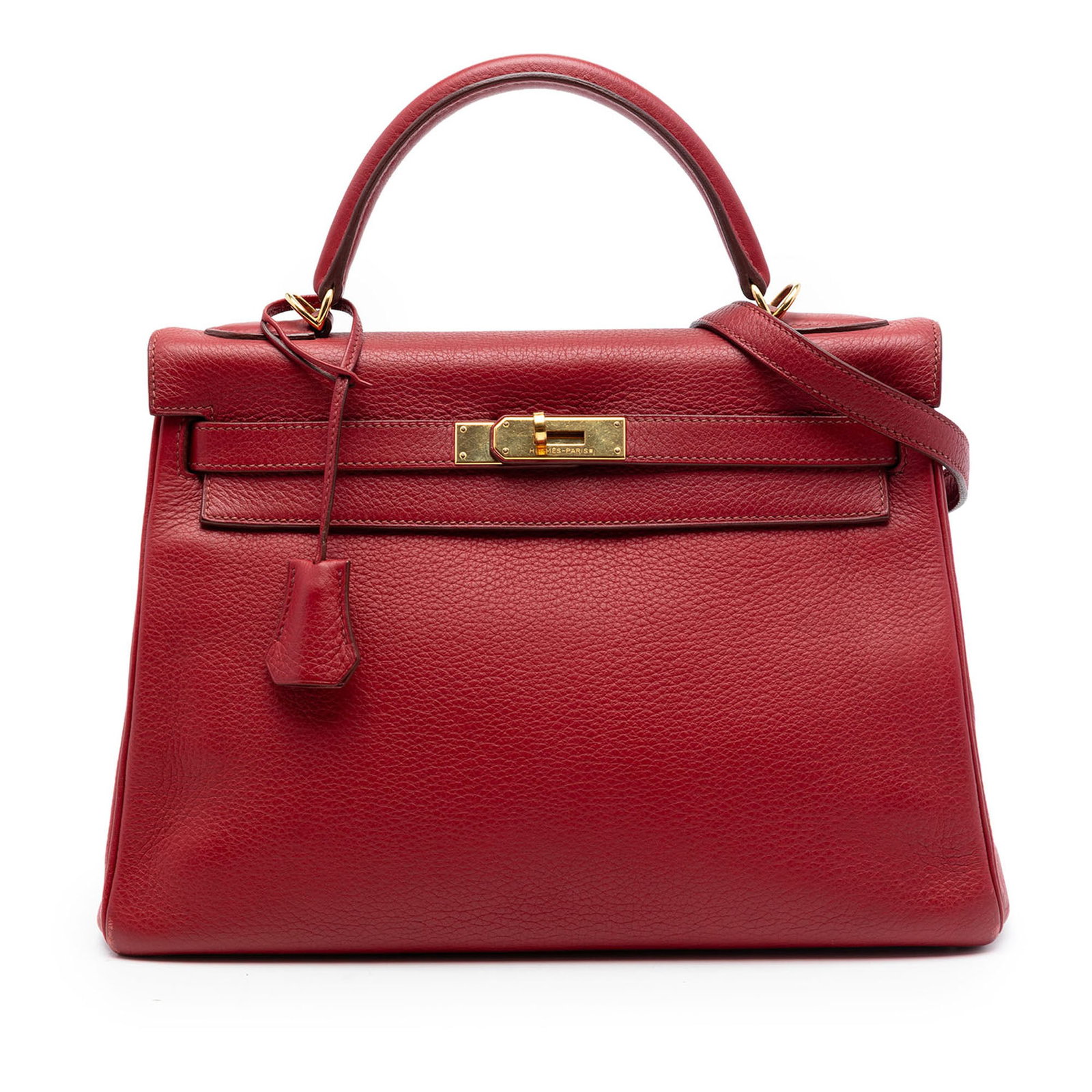 Hermes Kelly II Retourne 32 Clemence Leather Handbag Red: Hermes Kelly II Retourne 32 Clemence Leather Handbag Red This Hermes Kelly II Retourne 32 is a leather bag from France in Rouge Casaque red. It features a rolled leather top handle, a detachable flat 