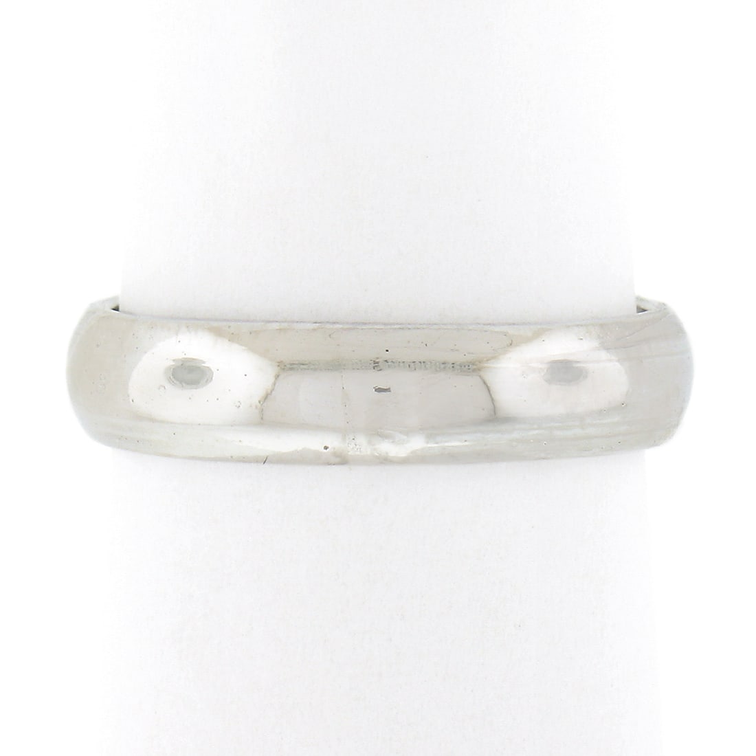 10K White Gold Wedding Band Ring 4mm Domed Polished Stackable: 10K White Gold Wedding Band Ring 4mm Domed Polished Stackable Classic unisex wedding band ring crafted in solid 10k white gold with a plain domed profile and polished finish. This stackable band is pr