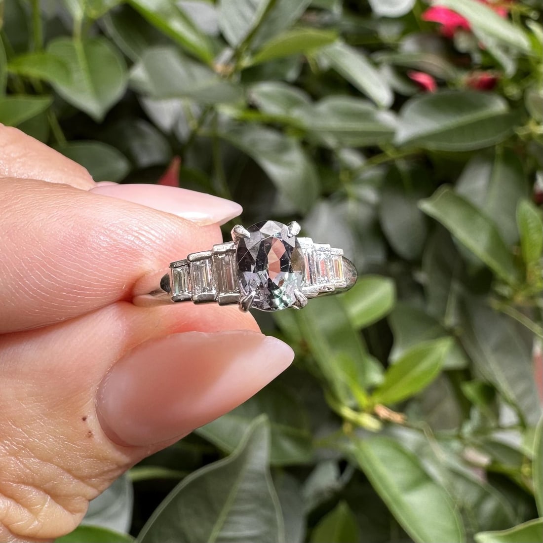 Platinum GIA Certified 1.51ct Color Change Garnet Diamond Ring: Platinum GIA Certified 1.51ct Color Change Garnet Diamond Ring This exquisite cocktail ring showcases a stunning natural genuine pyrope spessartine garnet, which features a brilliant oval cut with a c