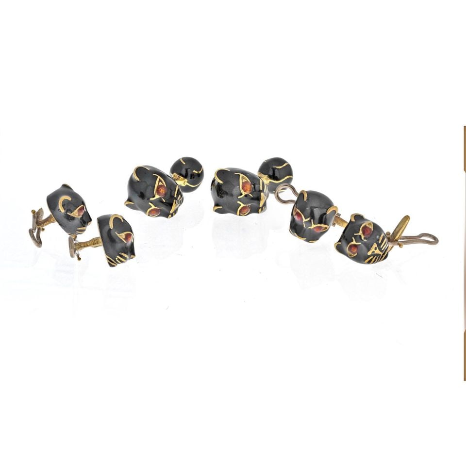 David Webb Black Panther Cuff Links in 18K Yellow Gold: David Webb Black Panther Cuff Links in 18K Yellow Gold Elevate your formal attire with these striking David Webb cuff links, designed in the iconic black panther motif. Crafted from luxurious 18K yell