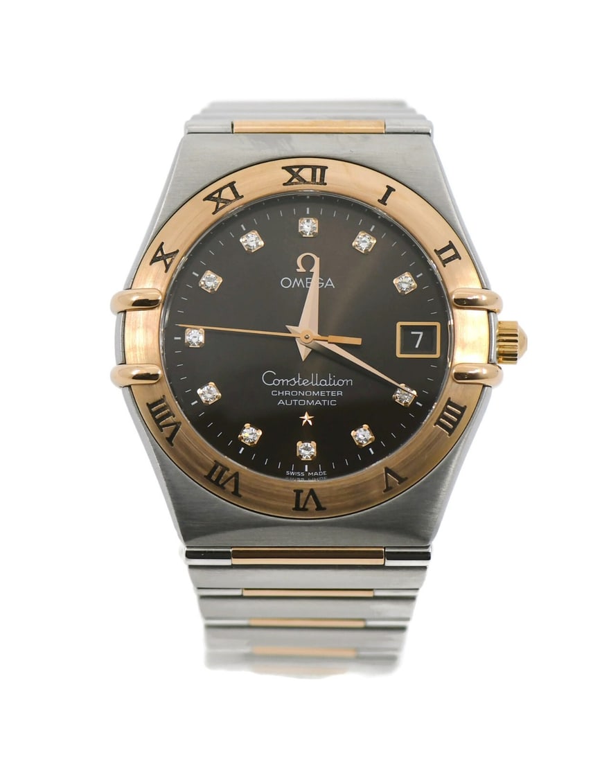 Omega Constellation 18K Gold and Steel Diamond Bezel 35mm Women's Watch: Omega Constellation 18K Gold and Steel Diamond Bezel 35mm Women's Watch This Omega Constellation Diamond wristwatch features a 35 mm stainless steel case and a diamond-set bezel. The brown dial is acc