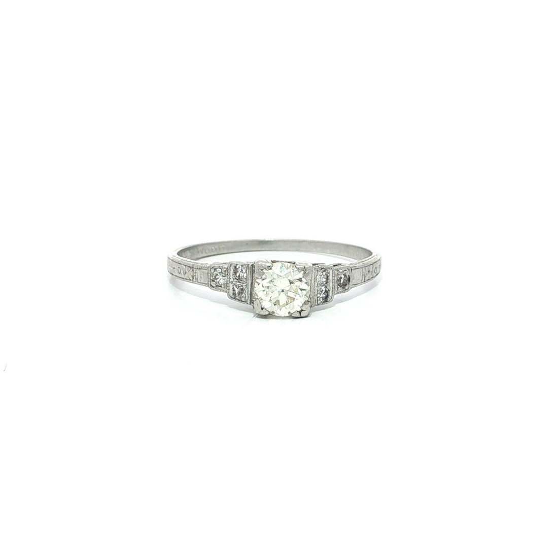 Antique Art Deco Platinum 0.34ct Diamond Dainty Ring: Antique Art Deco Platinum 0.34ct Diamond Dainty Ring This exquisite Antique Art Deco ring showcases a stunning design crafted in solid platinum. The centerpiece features a natural, genuine Old Europea