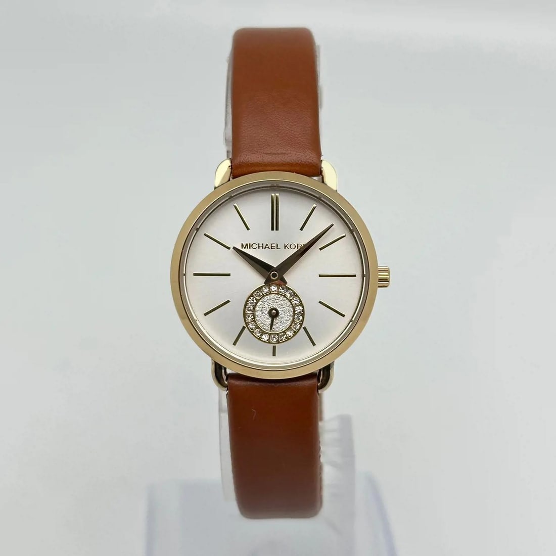 Michael Kors Petite Portia 28mm Gold-Tone Quartz Ladies Watch MK2734 with Crystals: Michael Kors Petite Portia 28mm Gold-Tone Quartz Ladies Watch MK2734 with Crystals Elevate your style with the Michael Kors Portia 28mm Quartz Ladies Watch, a stunning timepiece designed for casual dr