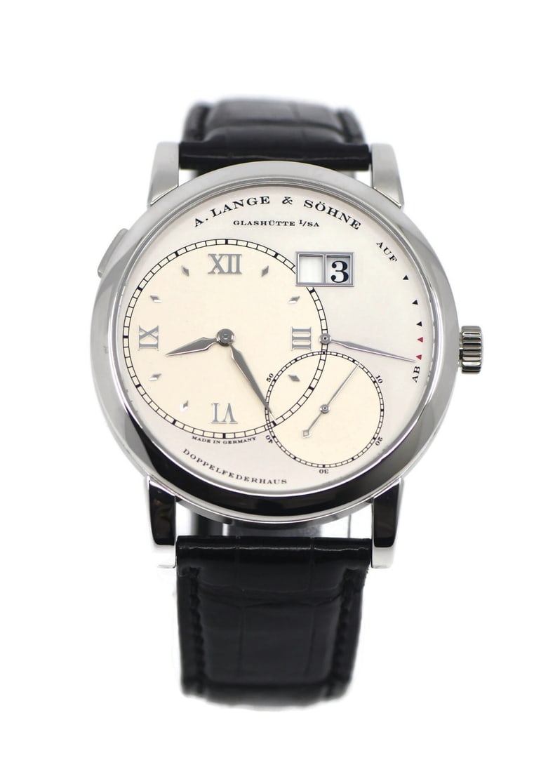 A. Lange and Sohne Lange 1 Platinum Wristwatch Ref 115.025: A. Lange and Sohne Lange 1 Platinum Wristwatch Ref 115.025 Pre-owned A. Lange & Sohne Lange 1 Grand wristwatch with a manual movement and analog silver dial. This men's watch features a polished plati