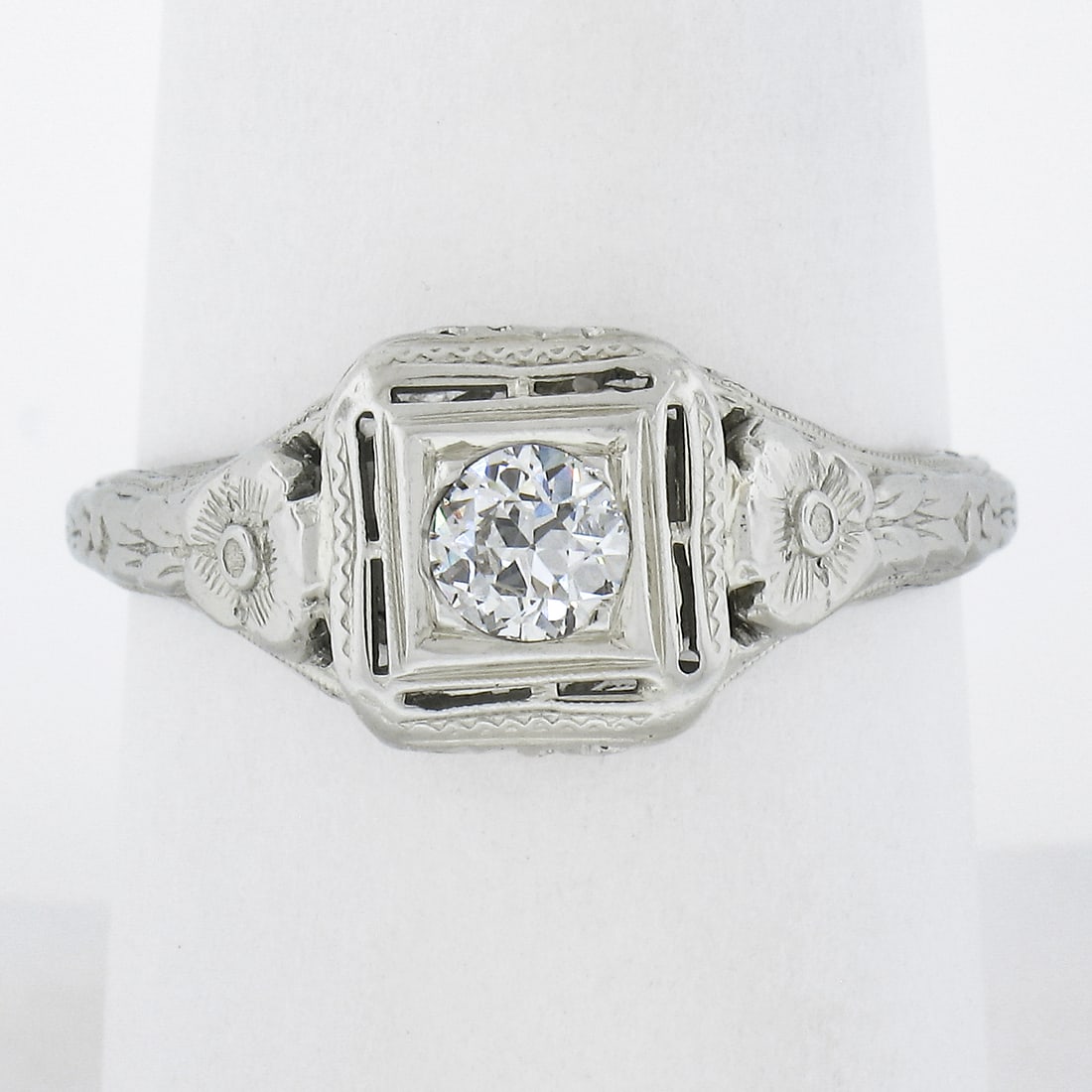 Antique 18k White Gold 0.28ct Old European Pave Diamond Floral Engagement Ring: Antique 18k White Gold 0.28ct Old European Pave Diamond Floral Engagement Ring This exquisite antique engagement ring is crafted from solid 18k white gold and showcases a stunning .28ct old European c