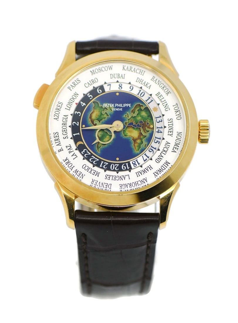Patek Philippe World Timer 18K Yellow Gold Watch 5231J-001 with Box and Papers: Patek Philippe World Timer 18K Yellow Gold Watch 5231J-001 with Box and Papers Discover the elegance of the Patek Philippe World Timer 18K Yellow Gold Watch, model 5231J-001. This exquisite