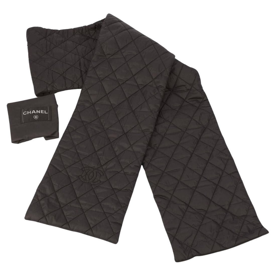 Chanel Black Quilted Cocoon Scarf with Storage Pouch: Chanel Black Quilted Cocoon Scarf with Storage Pouch Elevate your style with this luxurious Chanel Black Unisex Cocoon Scarf, crafted from high-quality materials in Italy. This exquisite scarf