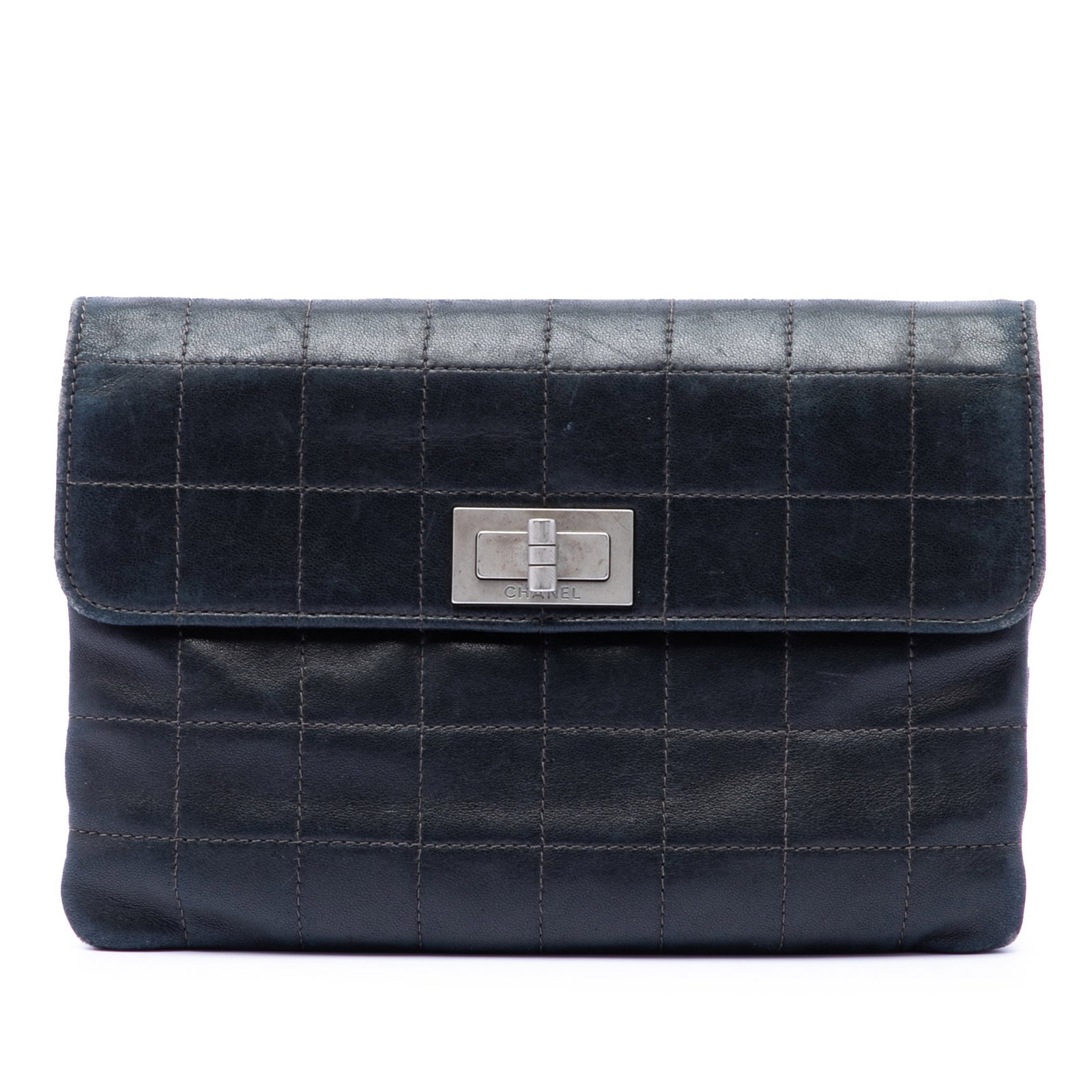 Chanel black lambskin 2.55 flap clutch bag: Chanel black lambskin 2.55 flap clutch bag This Chanel Choco Bar Lambskin Reissue 2.55 Flap Clutch features a quilted lambskin leather body in black, a back flat strap handle, a front flap with a