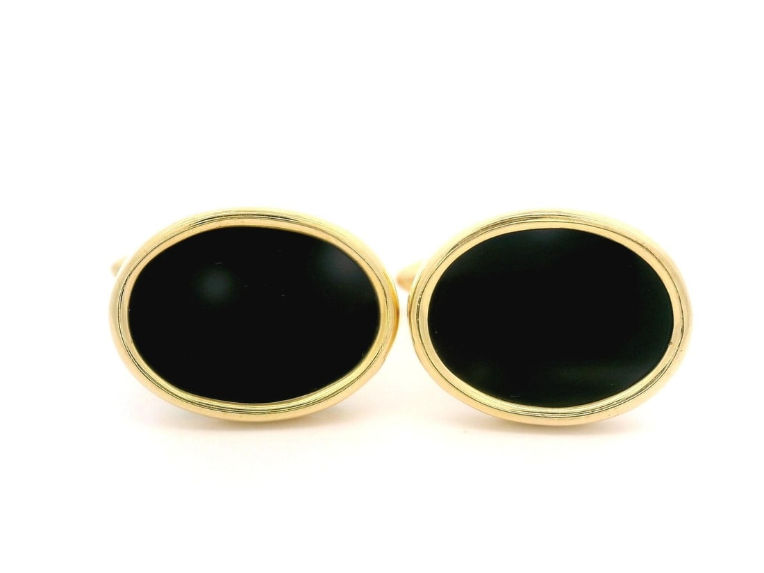 Men's 18k Yellow Gold Bezel Set Black Onyx Cufflinks: Men's 18k Yellow Gold Bezel Set Black Onyx Cufflinks Elevate your style with these exquisite Men's Solid 18k Yellow Gold Cufflinks featuring a striking oval cut bezel set black onyx. Crafted from natu