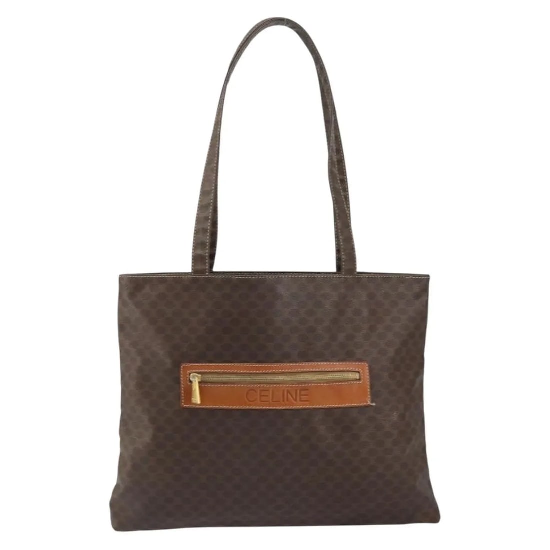 Celine Vintage Macadam Brown Canvas Tote Bag Italy: Celine Vintage Macadam Brown Canvas Tote Bag Italy This Celine Vintage Macadam tote bag features a classic brown canvas exterior and is designed for women. Made in Italy, the bag displays the iconic M