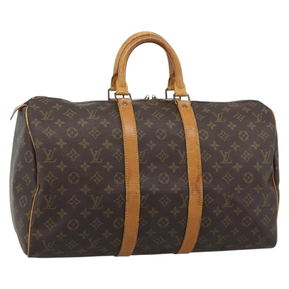Louis Vuitton Keepall Monogram Canvas Duffle Bag Brown: Louis Vuitton Keepall Monogram Canvas Duffle Bag Brown The Louis Vuitton Keepall is a unisex travel bag in brown canvas, made in France. It features leather trim and shows signs of use consistent with