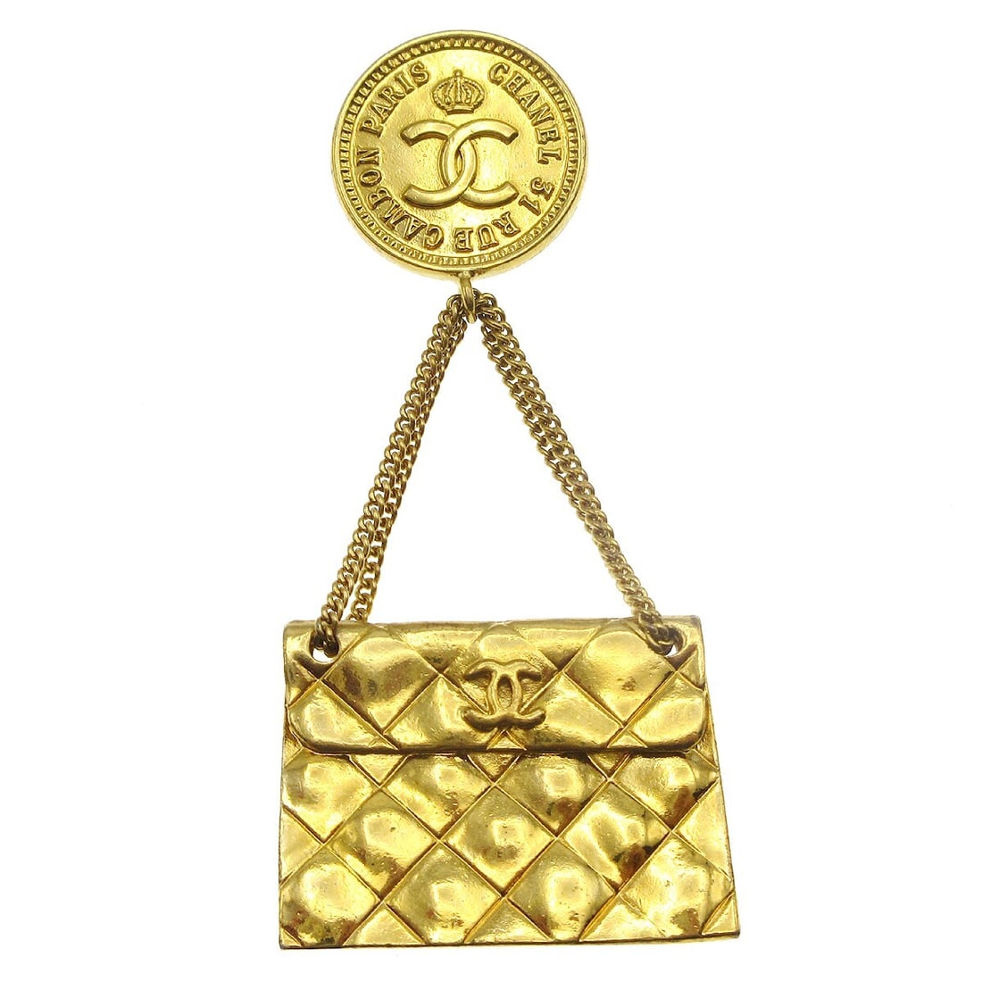 Chanel CC Quilted Bag Motif Gold Plated Brooch Pin: Chanel CC Quilted Bag Motif Gold Plated Brooch Pin Gold-tone CHANEL brooch pin featuring a CC quilted bag motif. Made in France, this piece is crafted in gold-plated metal and shows reasonable wear fr