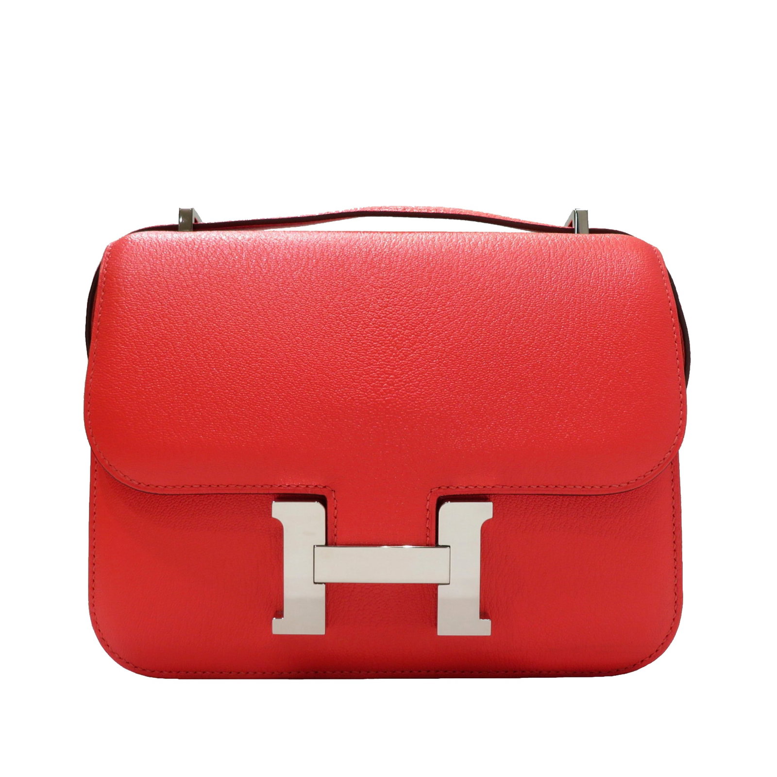 Hermes Mini Epsom Constance 18 Red Leather Bag with Dust Bag: Hermes Mini Epsom Constance 18 Red Leather Bag with Dust Bag The Hermes Mini Epsom Constance 18 is a stylish and compact bag crafted from high-quality leather. It features an adjustable shoulder strap