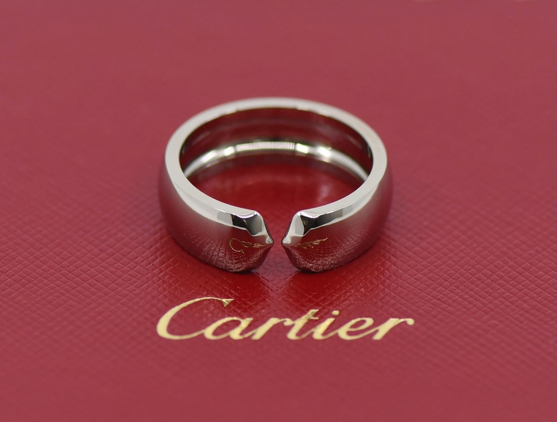 Cartier Absolu C 18K White Gold Ring Size 9.5 with Service Receipt: Cartier Absolu C 18K White Gold Ring Size 9.5 with Service Receipt Discover the elegance of the Cartier Absolu C 18K White Gold Ring, a stunning piece crafted from high-quality 18k white gold. This ri