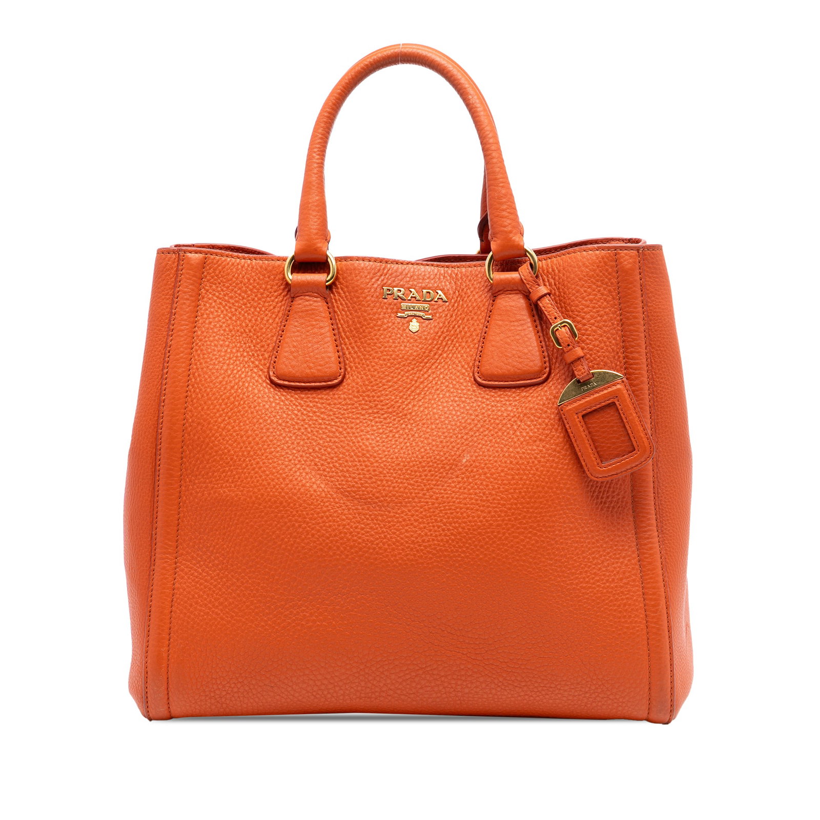 Prada Vitello Daino Orange Leather Convertible Satchel Tote Bag: Prada Vitello Daino Orange Leather Convertible Satchel Tote Bag This Prada Vitello Daino Open Convertible Tote is crafted from orange leather and features rolled leather top handles, an open top with 