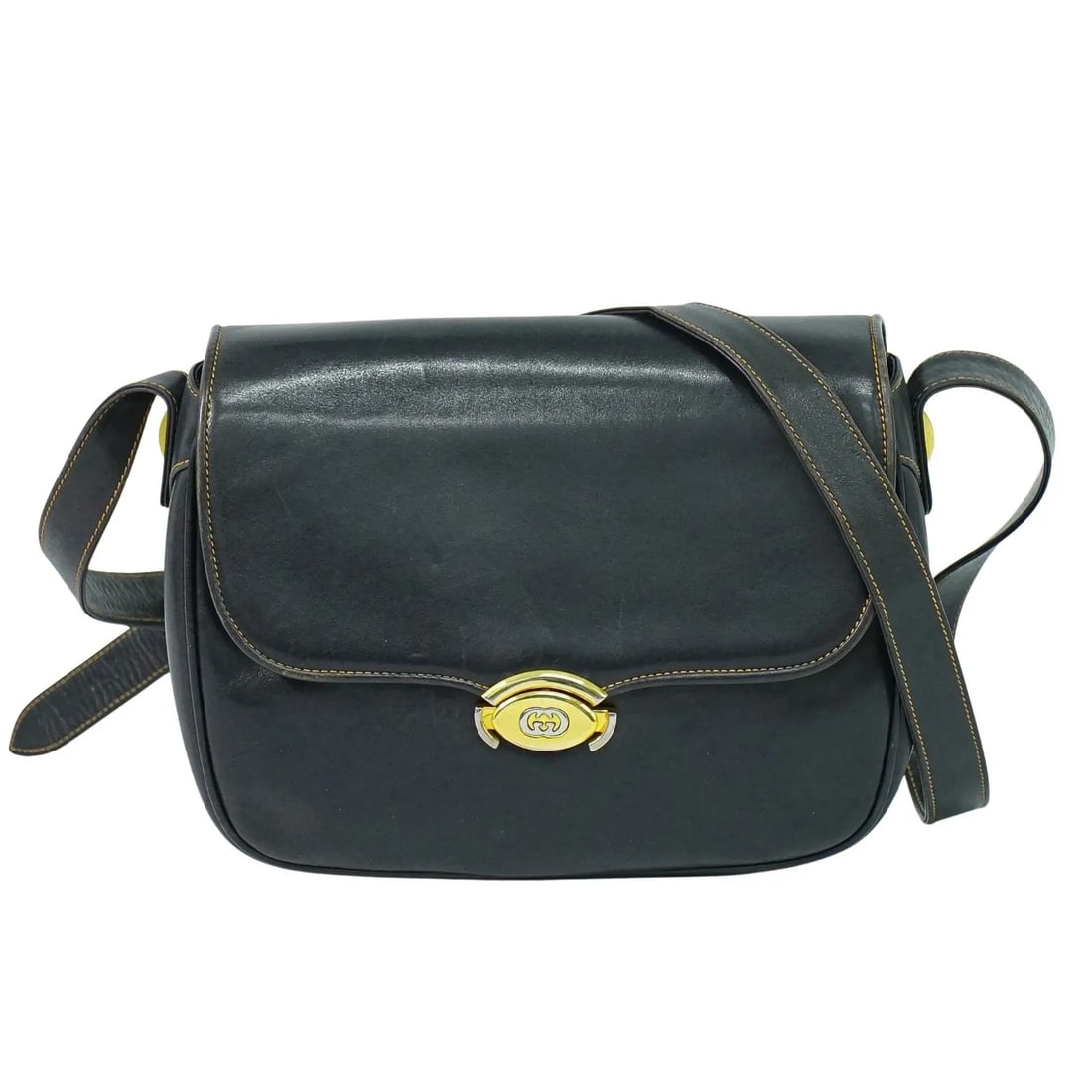 Gucci Vintage Navy Leather Shoulder Bag: Gucci Vintage Navy Leather Shoulder Bag This Gucci vintage shoulder bag is crafted from navy leather and designed for women. It features a classic silhouette with a shoulder strap, made in Italy. The 