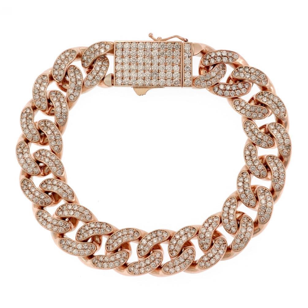 Men's 10ct Diamond Curb Link Bracelet in 14k Rose Gold: Men's 10ct Diamond Curb Link Bracelet in 14k Rose Gold This stunning men's bracelet is a remarkable addition to any jewelry collection, expertly crafted from luxurious 14k rose gold. It features a ser