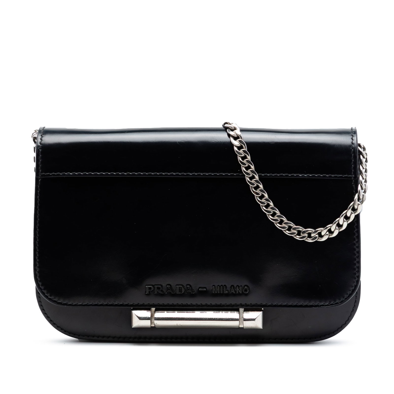 Prada Sybille Flap Crossbody Bag in Black Spazzolato Leather: Prada Sybille Flap Crossbody Bag in Black Spazzolato Leather Prada Sybille flap crossbody bag crafted in black spazzolato leather. This crossbody features a silver tone chain strap, a front flap with 