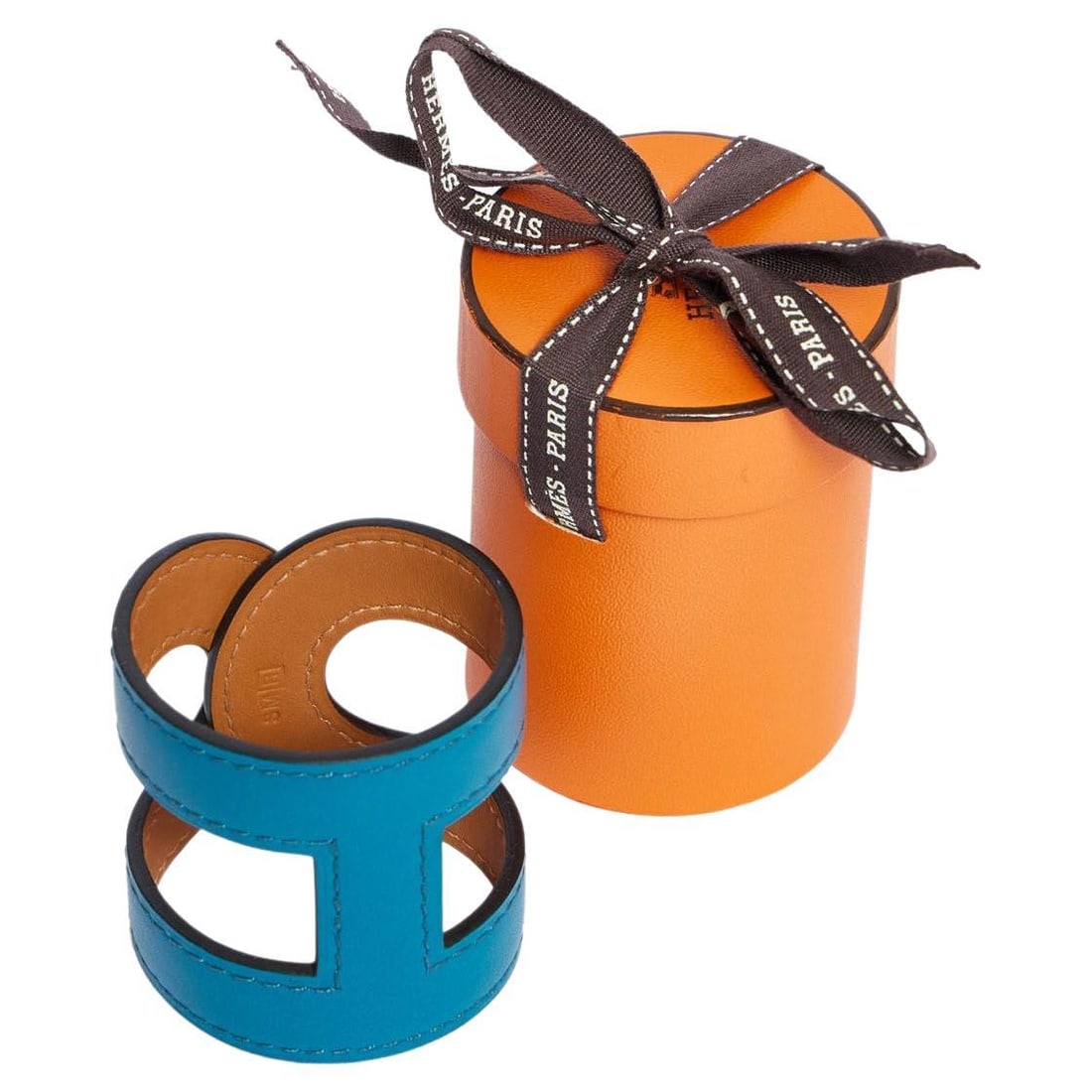 Hermes Blue Izmir Stretchy Cuff BNIB Authentic French Design: Hermes Blue Izmir Stretchy Cuff BNIB Authentic French Design Introducing a stunning stretchy cuff from Hermes, crafted from luxurious blue Izmir swift leather. This brand new, in box accessory showcas