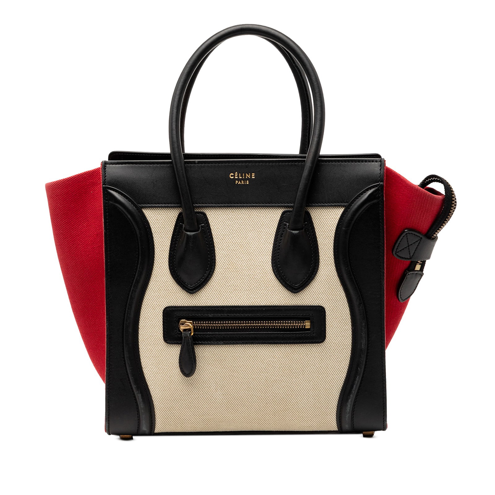 Micro Luggage Tote by Celine in Tricolor Canvas and Leather: Micro Luggage Tote by Celine in Tricolor Canvas and Leather This Celine Micro Tricolor Luggage Tote showcases a canvas body with leather trim, featuring rolled leather handles, a top zip closure, an e