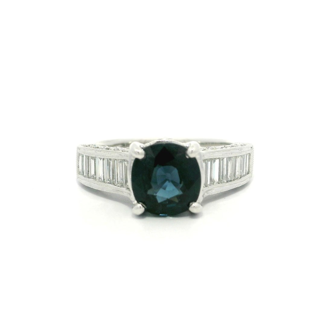 Platinum GIA 3.15ctw Dark Blue Spinel Ring with Diamond Sides: Platinum GIA 3.15ctw Dark Blue Spinel Ring with Diamond Sides This stunning cocktail ring showcases a mesmerizing natural dark blue cushion spinel, weighing 1.35 carats and certified by GIA. The spine