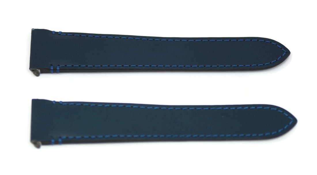 Cartier Santos Authentic Blue Leather Watch Strap 21mm: Cartier Santos Authentic Blue Leather Watch Strap 21mm Elevate your timepiece with this stunning Cartier Santos Blue Leather Strap. Designed specifically for the Cartier Santos model, this strap featu