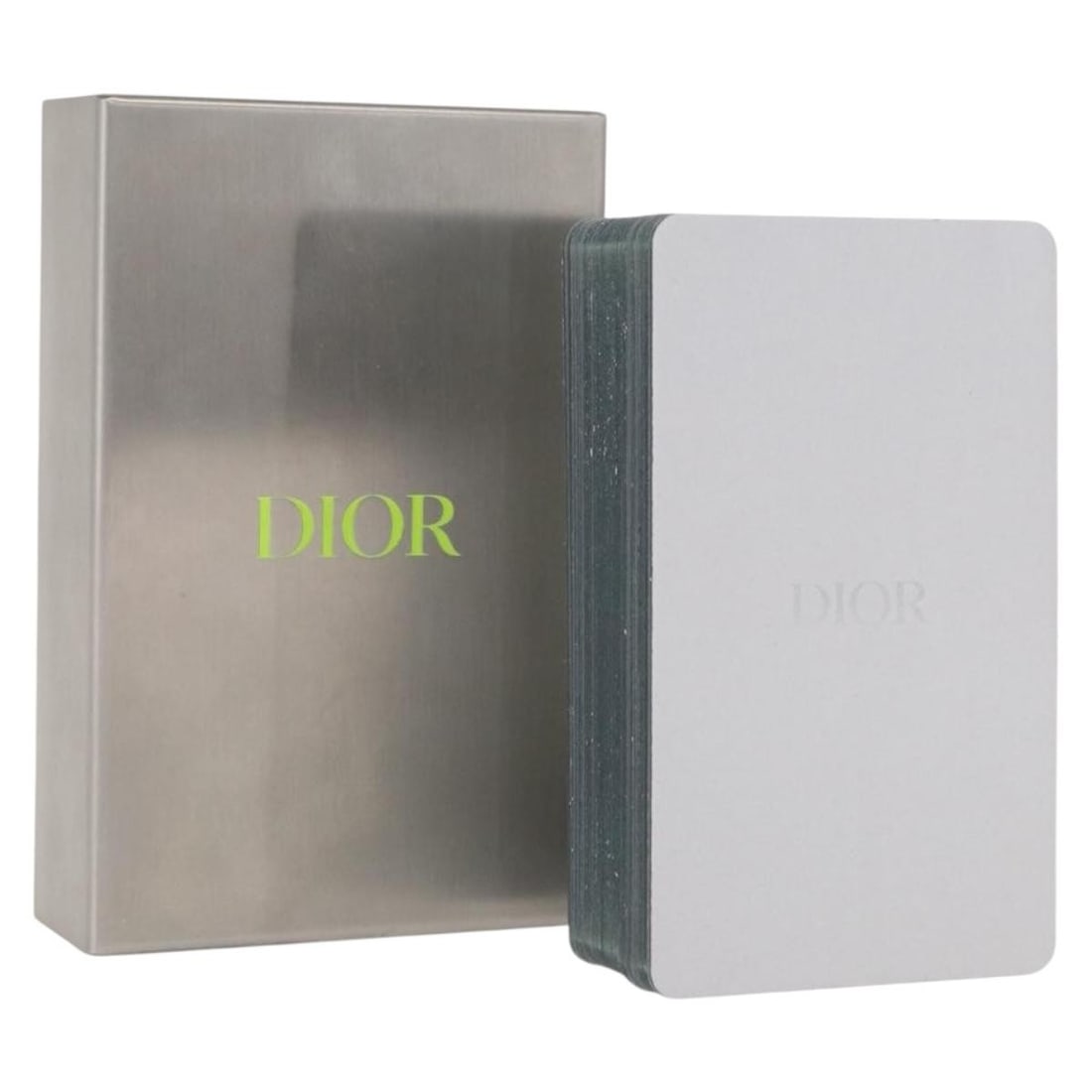 Silver Paper Playing Cards Set by Christian Dior with Box: Silver Paper Playing Cards Set by Christian Dior with Box This set of Christian Dior playing cards features a silver color and is crafted from paper. The set comes with the original item box and origi