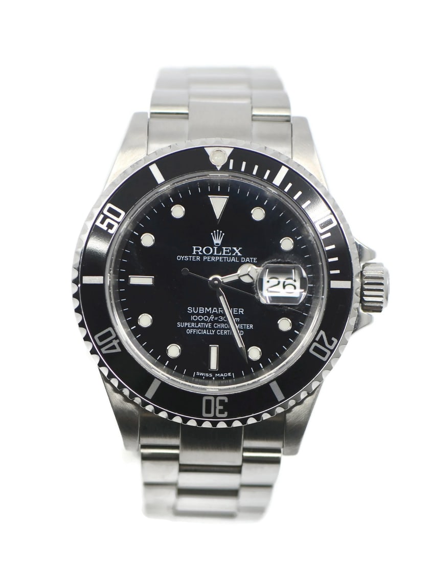 Rolex Submariner 16610 Automatic Black Dial Date Watch: Rolex Submariner 16610 Automatic Black Dial Date Watch This Rolex Submariner reference 16610 is a stainless steel wristwatch featuring a black dial and unidirectional rotating black bezel. The watch i