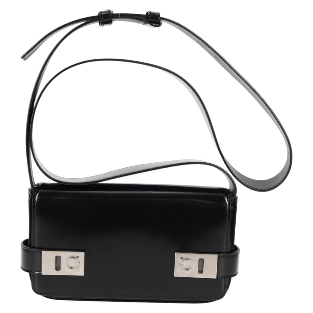 Black Patent Leather Shoulder Bag Salvatore Ferragamo Gancini with Dust Bag: Black Patent Leather Shoulder Bag Salvatore Ferragamo Gancini with Dust Bag A Salvatore Ferragamo Gancini shoulder bag in black patent leather, made in Italy. It comes with a dust bag and features a s