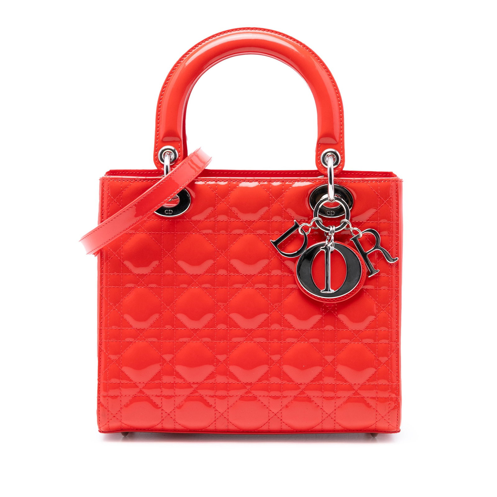 Dior Medium Cannage Lady Dior Patent Leather Bag: Dior Medium Cannage Lady Dior Patent Leather Bag This Lady Dior handbag features a striking orange patent leather body with the signature Cannage pattern. It is designed with flat top handles, a detac