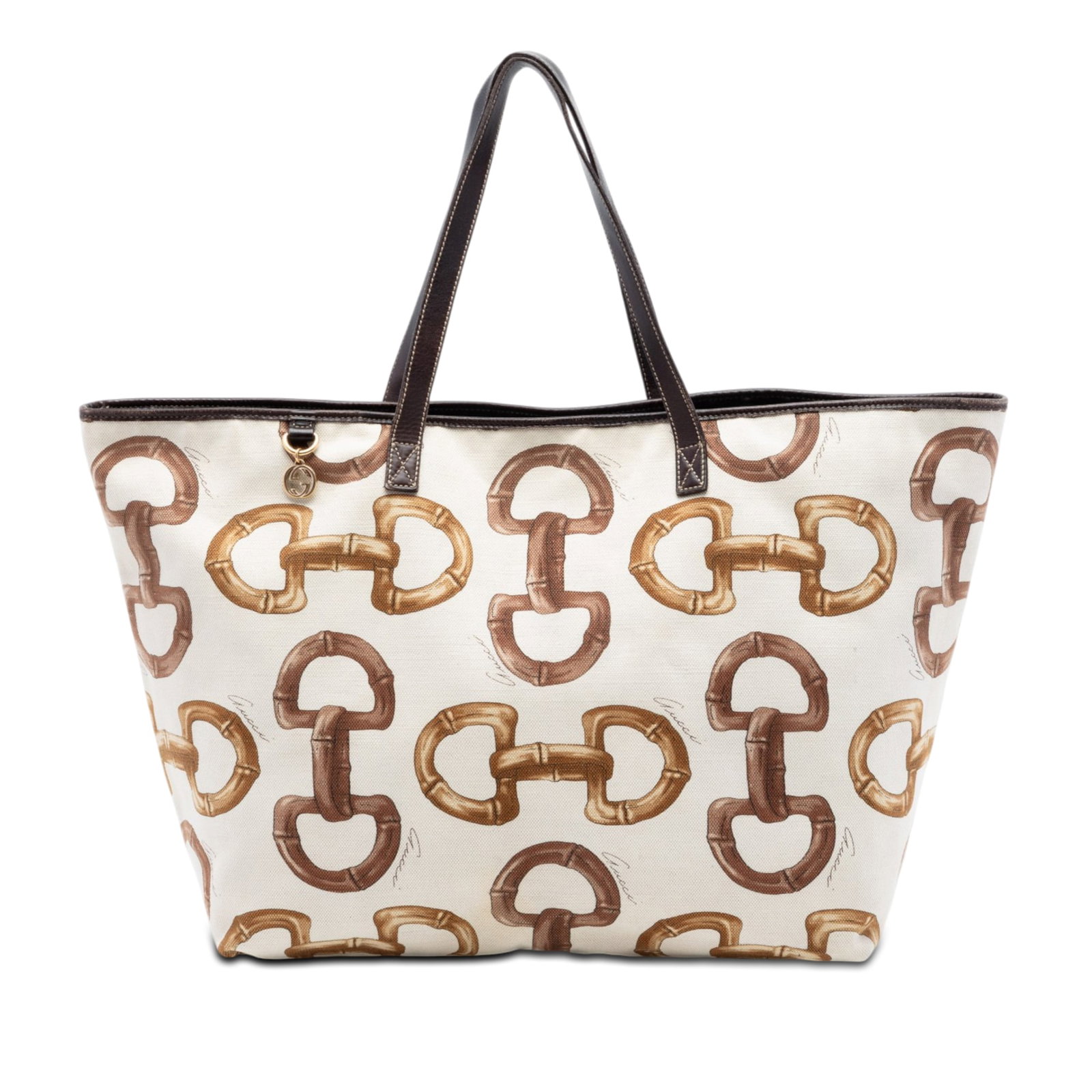 Gucci Bamboo Horsebit Printed Canvas Tote Bag: Gucci Bamboo Horsebit Printed Canvas Tote Bag This Gucci Printed Canvas Bamboo Horsebit Tote features a printed canvas body with leather trim, flat leather straps, an open top, and an interior zip poc