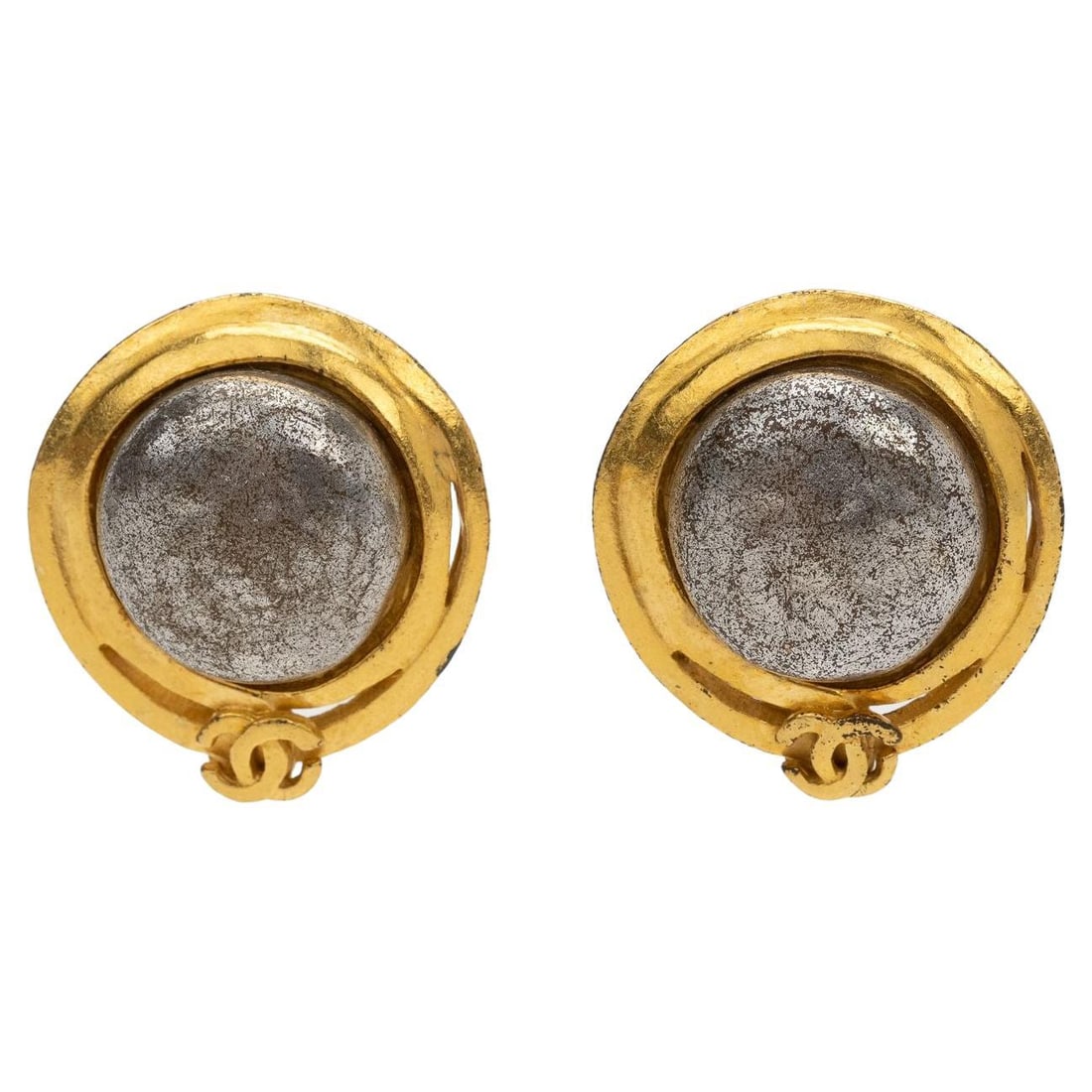 Chanel clip-on earrings with silver stone and gold CC ribbon: Chanel clip-on earrings with silver stone and gold CC ribbon Vintage Chanel clip-on earrings featuring a silver stone framed with a gold CC logo ribbon. The piece is described as vintage and is in exc