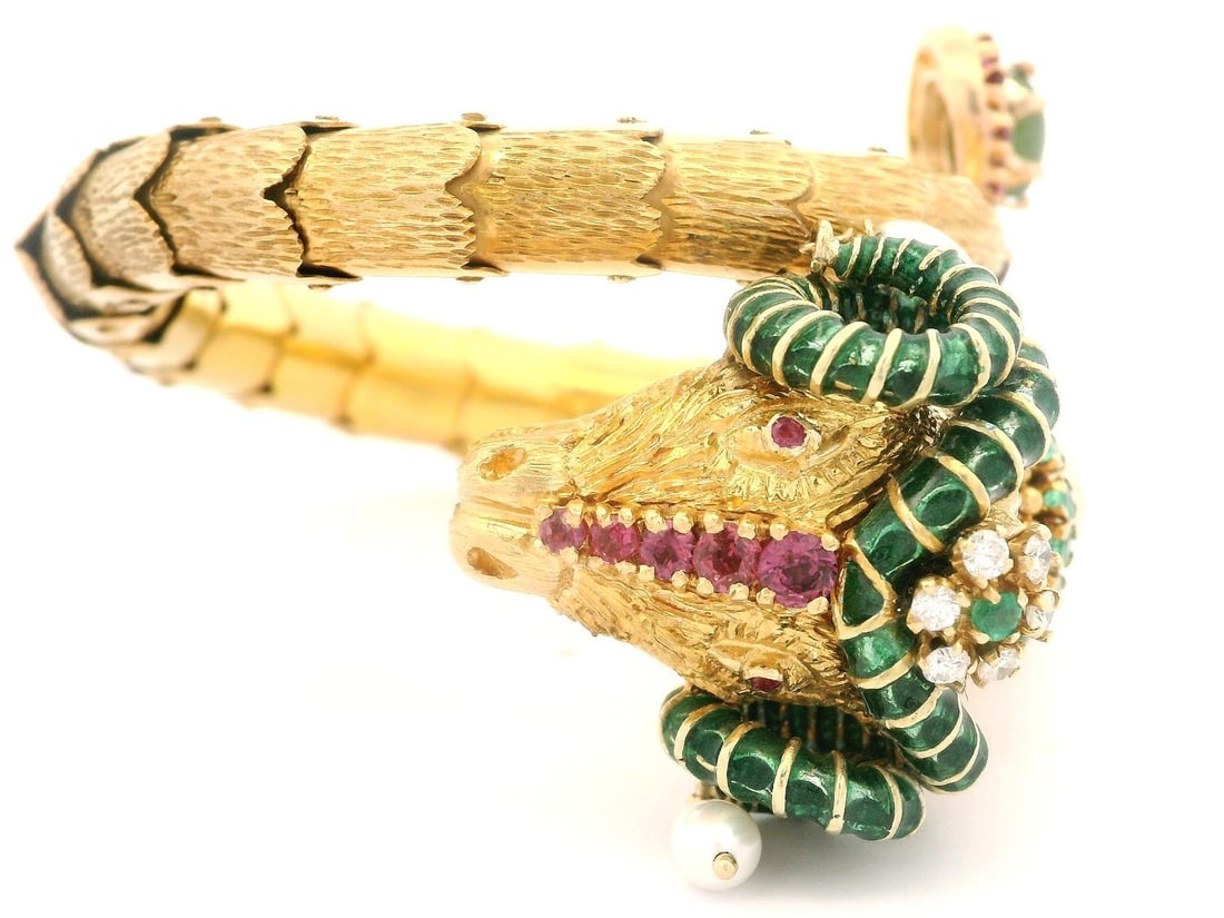 Vintage 14k Yellow Gold Ram Wrap Bracelet with Jade Emerald Ruby Diamond Pearls: Vintage 14k Yellow Gold Ram Wrap Bracelet with Jade Emerald Ruby Diamond Pearls This exquisite vintage cuff bracelet features a captivating blend of natural gemstones and luxurious materials. Crafted 